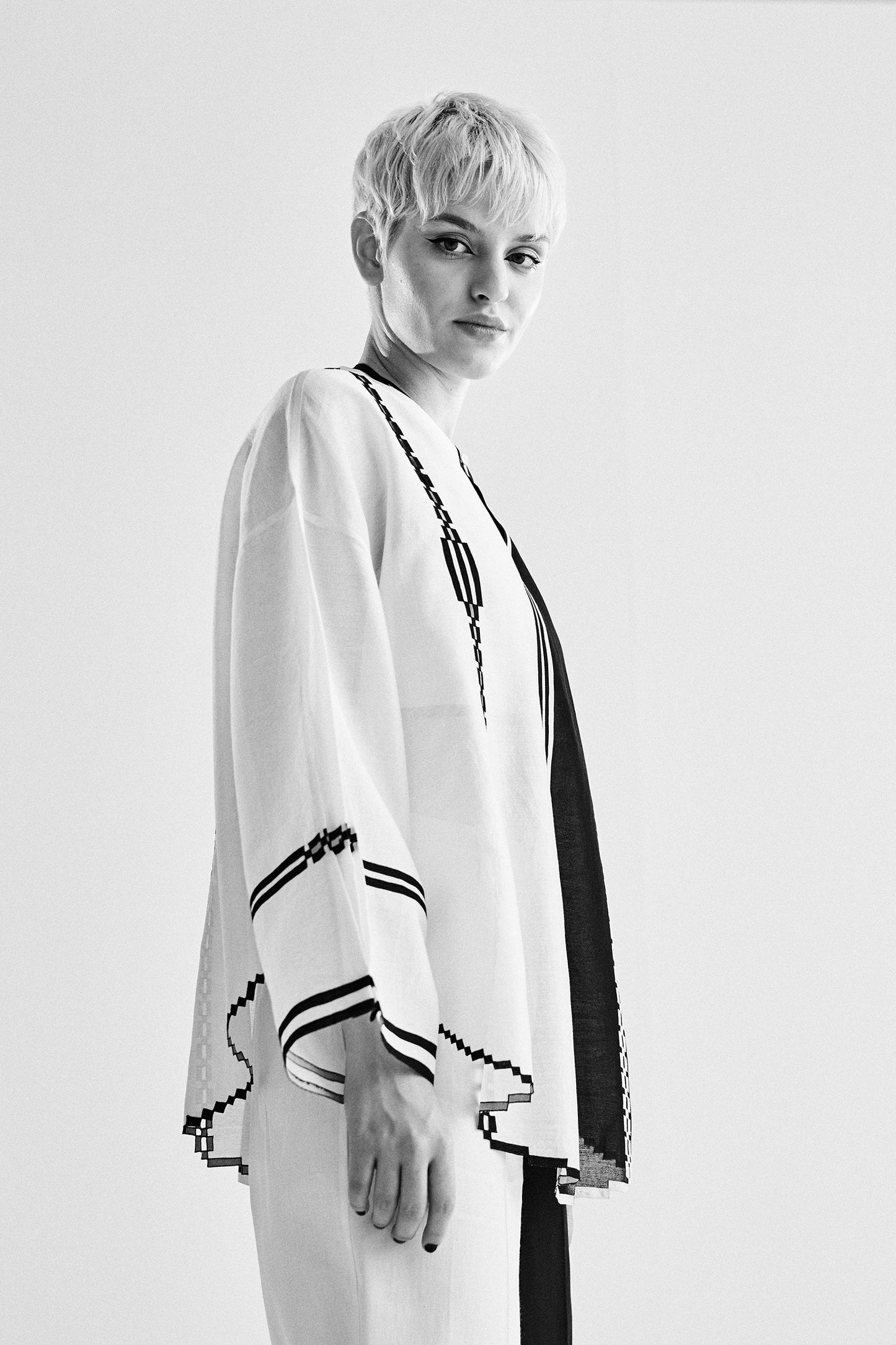 ROUND HEM COLOUR BLOCKED APPLIQUE' AND CUTWORK SHIRT