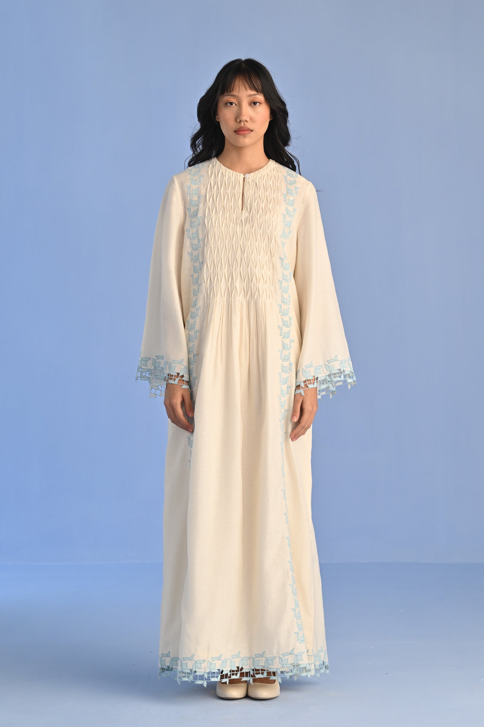 PLEATED DRESS WITH CUTWORK