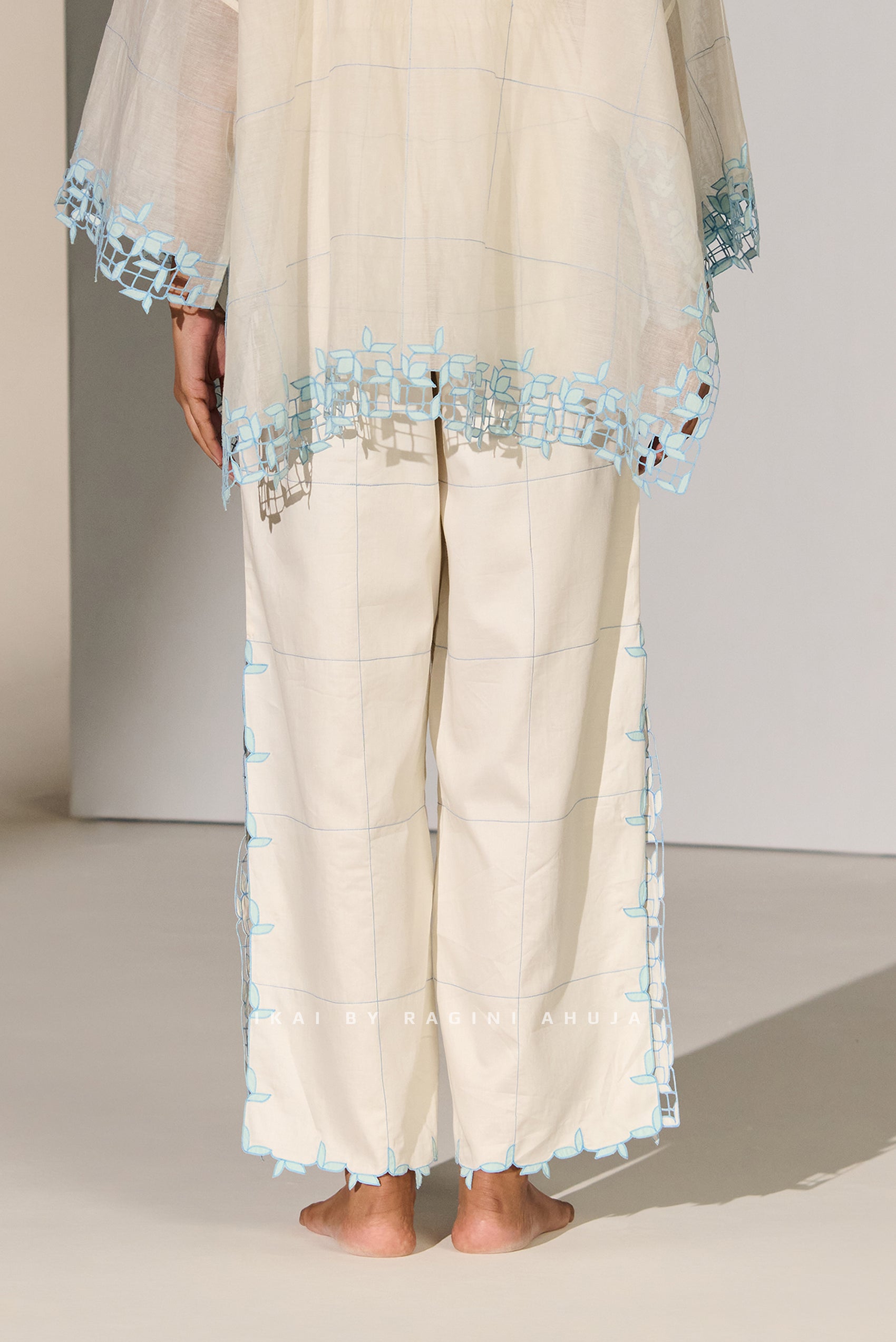 GEOMETRIC FLORAL CUTWORK HIGH SLIT PANTS